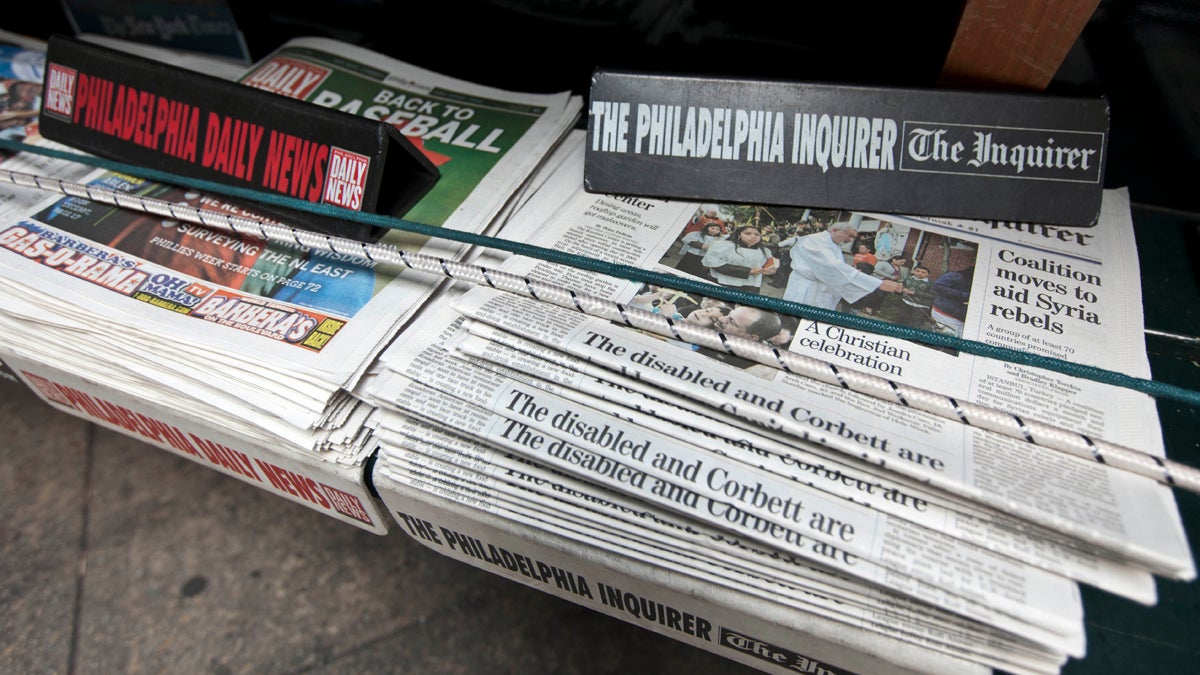  The Philadelphia Inquirer and Daily News newspapers sit on display on a newsstand. (AP Photo/Matt Rourke, file) 