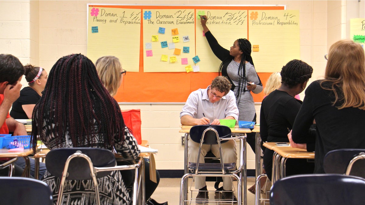  Consulting teacher Dana Singletary prepares a group of new teachers for the classroom during an orientation session at The Arts Academy at Benjamin Rush in Northeast Philadelphia. (Emma Lee/WHYY) 