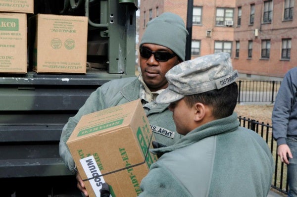 <p><p>Sgt. Karl Reddick and Pfc. Joseph Castrogriovanni unload supplies at the Hammel Houses Community Center in Rockaway, New York. (US Army photo by Sgt 1st Class William Gates, courtesy DEARNG)</p></p>
