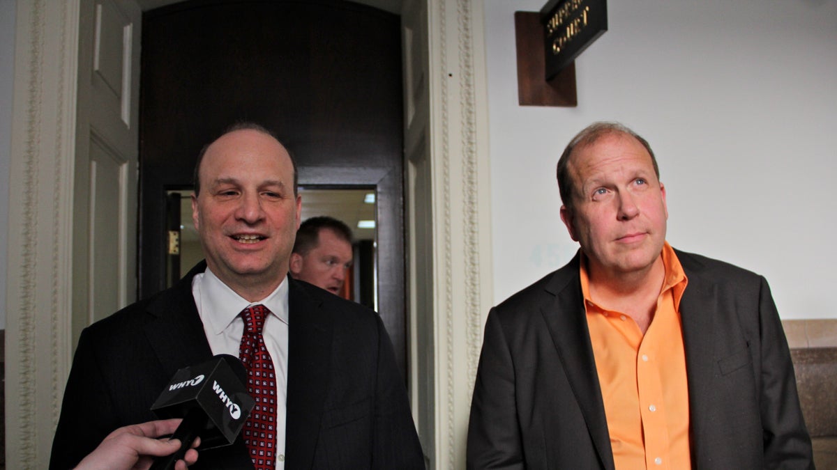 Attorney Martin Black (left) and state Sen. Daylin Leach speak with reporters after arguments before the Pennsylvania Supreme Court. (Emma Lee/WHYY)