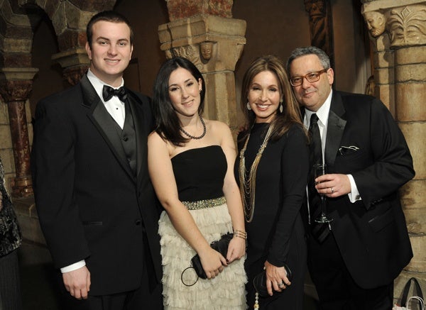 <p><p>Gala planning committee chair and Devereux parent Shaye Schloss (second from right) with her husband, David (right), daughter Isabel (center) and guest Matthew Haas. (Photo courtesy of Phil Stein Photography)</p></p>
