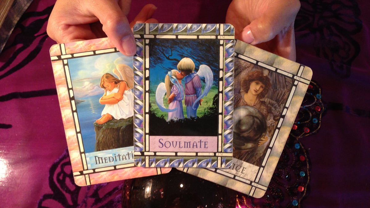dinah-wanko_1200x675 Dinah Wanko, of New Age Psychic Boutique in Llanerch, Pa., is shown holding tarot cards. (Image courtesy of Shawn McGill.)