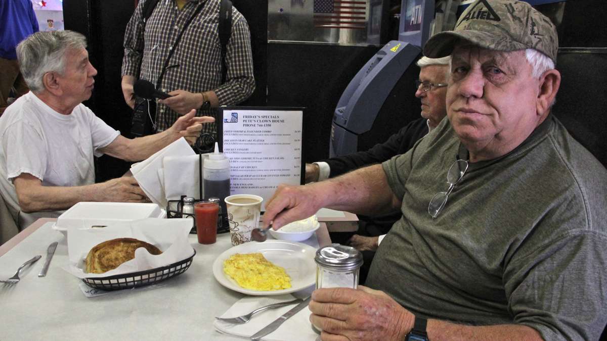 Clown House regular Ken Cooper settles in for eggs and grits with old friends.