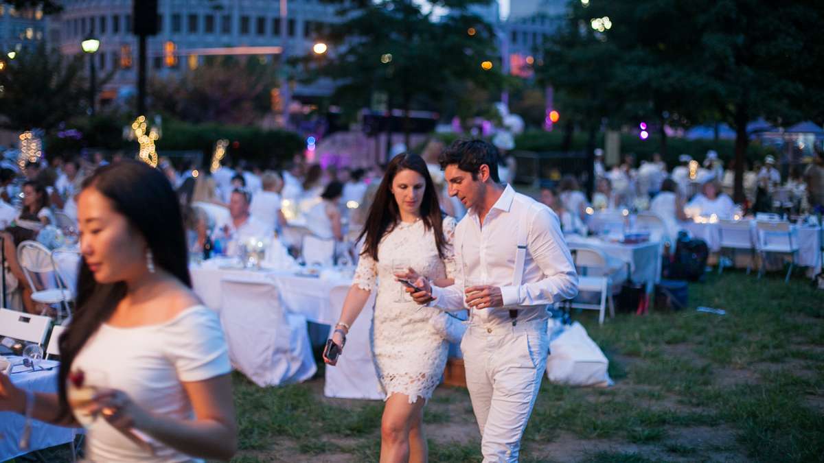 The sixth annual Dîner en Blanc came to Franklin Square Thursday evening. With an estimated 5,300 in attendance it was the largest Diner en Blanc event ever held in the United States. (Brad Larrison for NewsWorks)