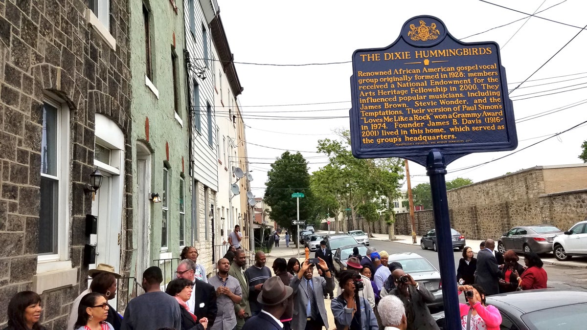  A plaque honoring the renowned African-American gospel group the Dixie Hummingbirds marks the former home of group founder James B. Davis near Girard College. (Peter Crimmins/WHYY) 