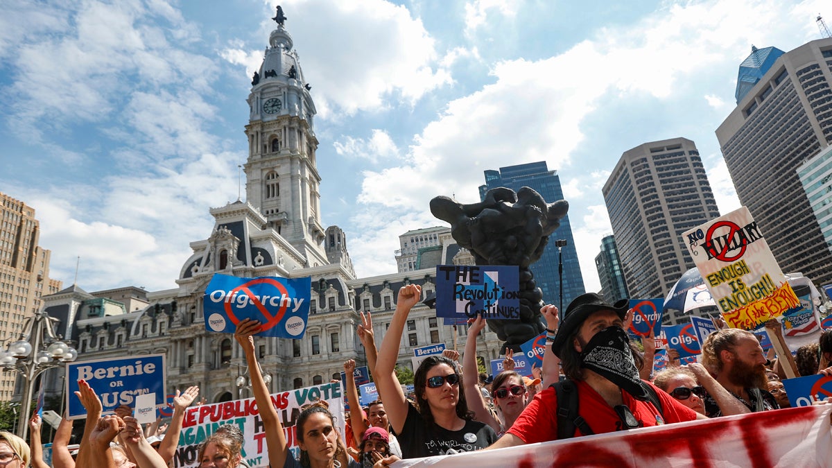  Supporters of Sen. Bernie Sanders, I-Vt., cheer during a protest near City Hall in Philadelphia, Wednesday, July 27, 2016, during the third day of the Democratic National Convention. (AP Photo/John Minchillo) 