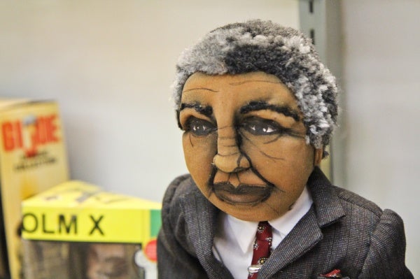 <p><p>This cloth Nelson Mandela doll resides in a display case with other celebrity dolls and dolls of the Civil Rights movement. (Kimberly Paynter/for NewsWorks)</p></p>
