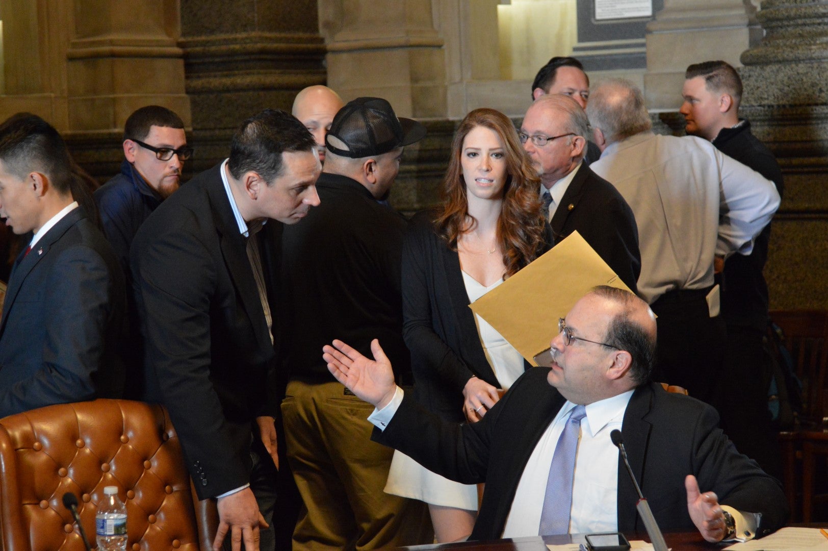  Councilman Alan Domb (seated) speaks with Ed Jones, who sells beverages for Pepsi in Philadelphia (Tom MacDonald/WHYY) 