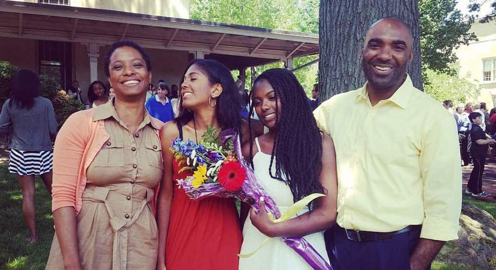  Dwayne Wharton (right) is shown with his wife and daughters. (Image courtesy of Dwayne Wharton) 