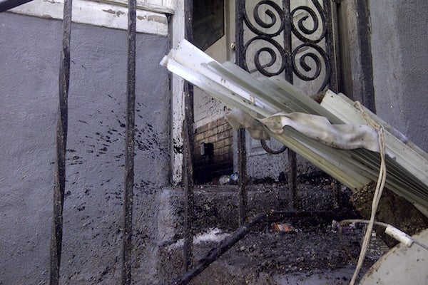 <p><p>At the scene later Wednesday morning, soot and ash was evident. (Brian Hickey/WHYY)</p></p>
