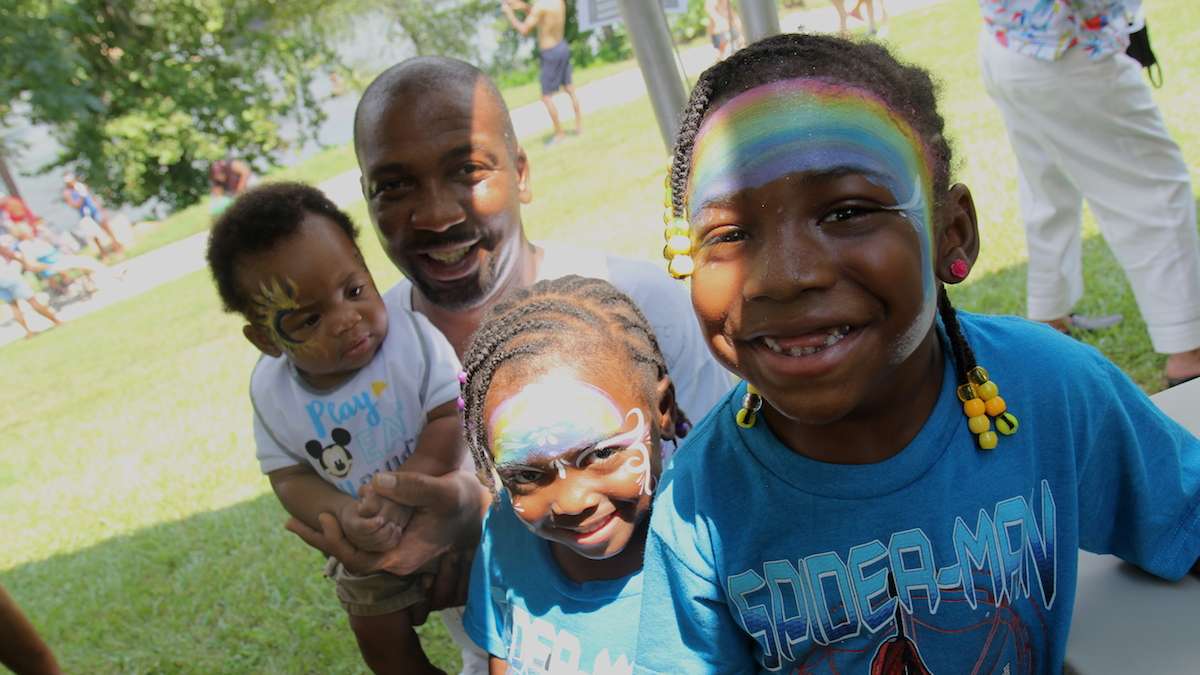 The Jones family had their faces painted to celebrate the 2017 total solar eclipse. (Kimberly Paynter/WHYY)