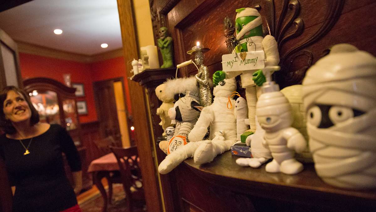 Halloween is an important holiday in the Wegner household, the display on the mantel is just a small sampling of their mummy collection, said Jennifer.  (Lindsay Lazarski/WHYY) 