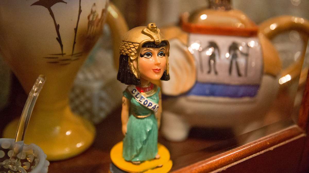 Jennifer specializes in ancient Egyptian language from the time period of Cleopatra.  She also collects Cleopatra figurines including this bobble-head.  (Lindsay Lazarski/WHYY)