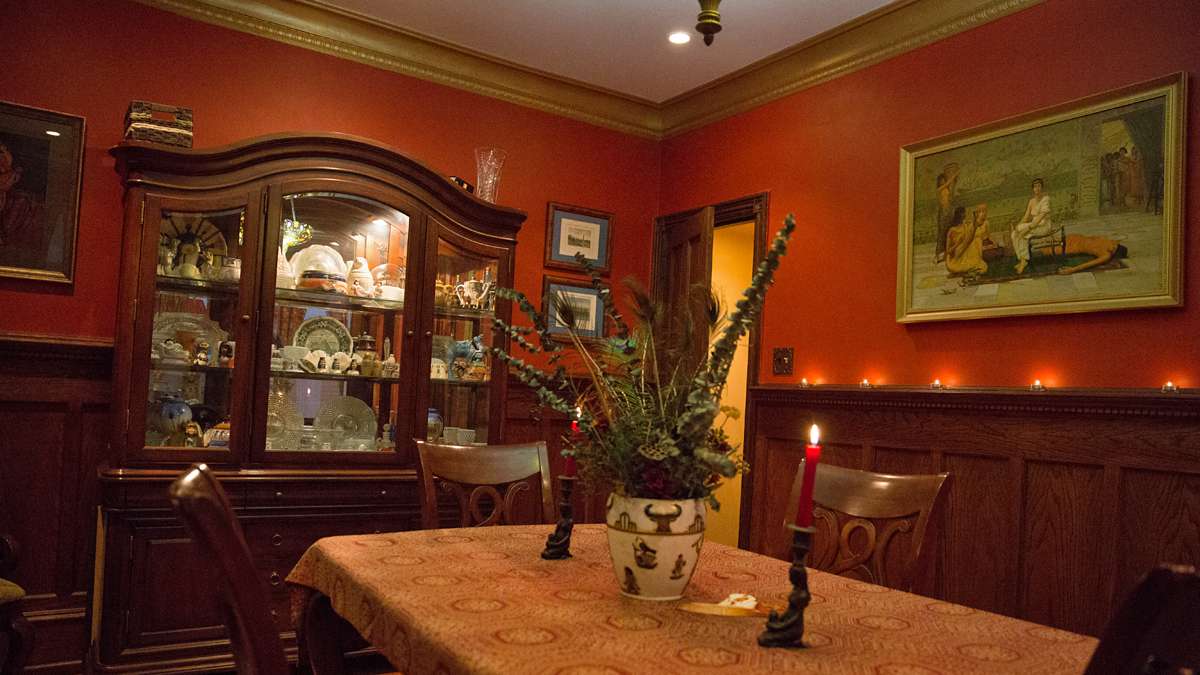 The Wagners display Egyptian art and a curio cabinet with whimsical knick-knacks in their dining room. (Lindsay Lazarski/WHYY)