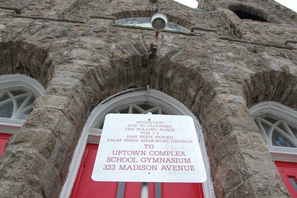 <p>A sign in front of the Price Memorial Church in Atlantic City directs voters to an alternate polling place. (Emma Lee/for NewsWorks)</p>
