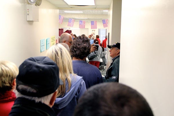 <p>Long lines develop at the Ventnor Community Building, which usually serves two voting districts. The facility had to accomodate two extra districts displaced because of Hurricane Sandy. (Emma Lee/for NewsWorks)</p>
