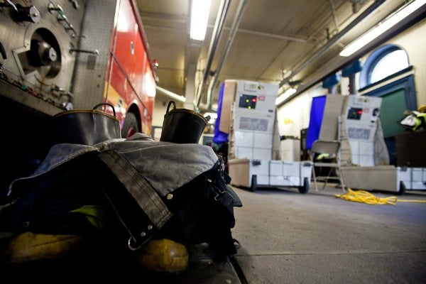 <p><p><span style="font-size: 12pt; line-height: 115%; font-family: 'Helvetica','sans-serif';">Firefighter boots rest behind the polling stations at Fire Engine #37 in Chestnut Hill Tuesday. (Brad Larrison/ for NewsWorks)</span></p></p>
