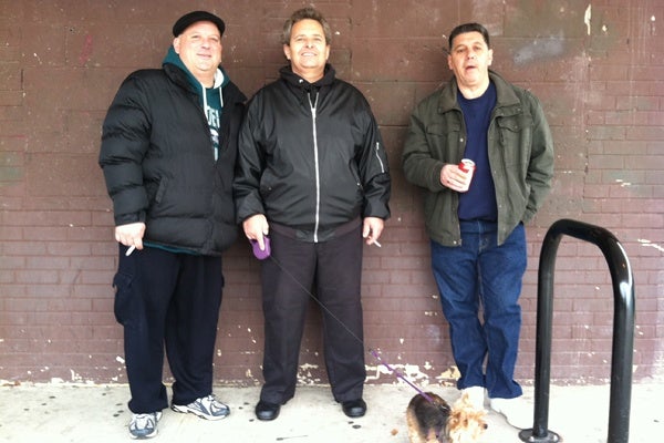 <p>Joseph Accardo of South Philadelphia (far right) said he voted for the candidates that would best protect his economic interests: Democratic Presidential candidate Barack Obama and Republican Senate candidate Tom Smith. ?"I think Romney is for the rich," said Accardo.  (Benjamin Herold/WHYY)</p>
