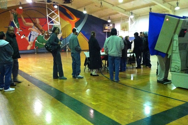 <p>Voters wait in line at Guerin Recreation Center at 16th and Jackson Streets in South Philadelphia.  (Benjamin Herold/WHYY)</p>
