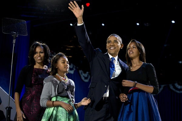 <p><p>President Barack Obama waves as he walks on stage with first lady Michelle Obama and daughters Malia and Sasha at his election night party Wednesday, Nov. 7, 2012, in Chicago. Obama defeated Republican challenger former Massachusetts Gov. Mitt Romney. (AP Photo/Carolyn Kaster)</p></p>
