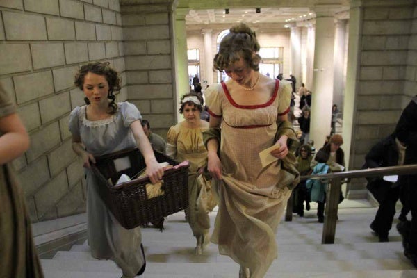 <p><p>Old Academy Players carry their props from location to location during a series of pop-up performances of scenes from "Pride and Prejudice." (Emma Lee/for NewsWorks)</p></p>
