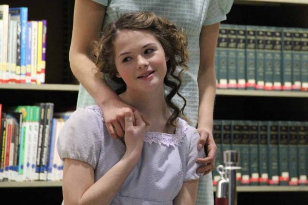 <p><p>Kitty (Jessica Hobbs-Pifer) dreams of wedded bliss during the Old Academy Players performance of "Pride and Prejudice" at the Free Public Library. (Emma Lee/for NewsWorks)</p></p>
