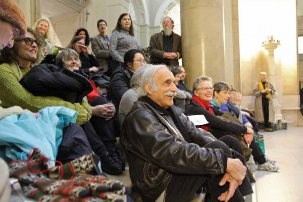 <p><p>Audience members find seats on the steps in front of the Social Science and History department of the Free Public Library to watch a performace of scenes from "Pride and Prejudice." (Emma Lee/for NewsWorks)</p></p>
