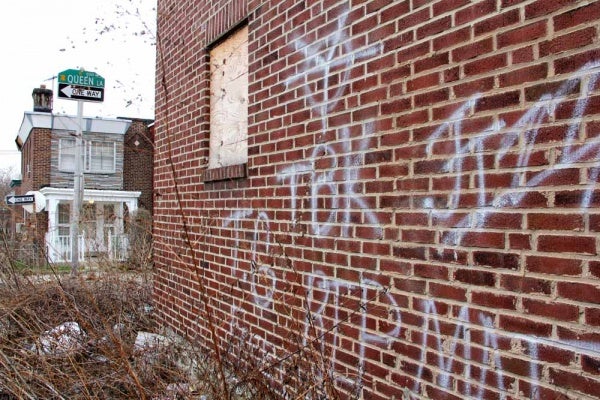 <p><p>A vacant home on Queen Lane at West Clarkson Avenue is marked by the TBK (Terrace Born Killers), one of several neighborhood-based gangs that claim turf in the neighborhoods around Germantown and King. (Emma Lee/for NewsWorks)</p></p>
