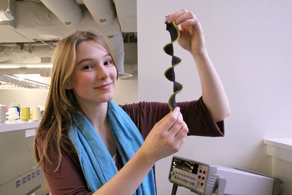 <p><p>Drexel mechanical engineering student Sylvia Herbert holds a knitbot. The knitting structure and a shape memory wire within the knitbot create a capacity for movement that could be useful in robotics. (Emma Lee/for NewsWorks)</p></p>
