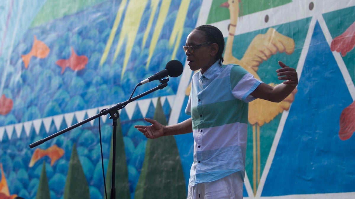  Faith Bartley is shown telling her story at a live Every ZIP Philadelphia storytelling event. (Miguel Martinez/WHYY) 