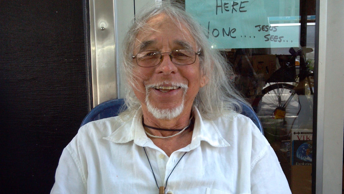  Larry Falcon in front of his West Philly shop. (Marcus Biddle/for NewsWorks) 