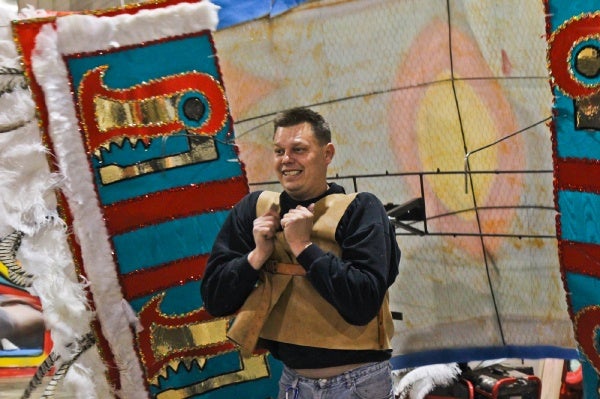 <p>"I feel like I just went 10 rounds with Tyson," said Ed Drumstas of the Saturnalian Brigade as he gets fitted for his New Year's costume. (Kimberly Paynter/WHYY)</p>
