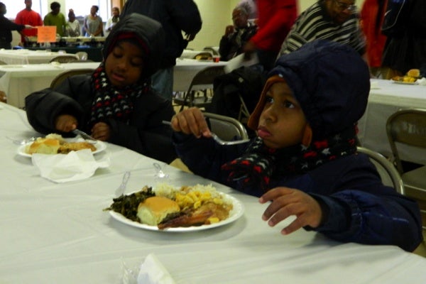 <p><p>Children enjoying the meal. (Kiera Smalls/for NewsWorks)</p></p>
