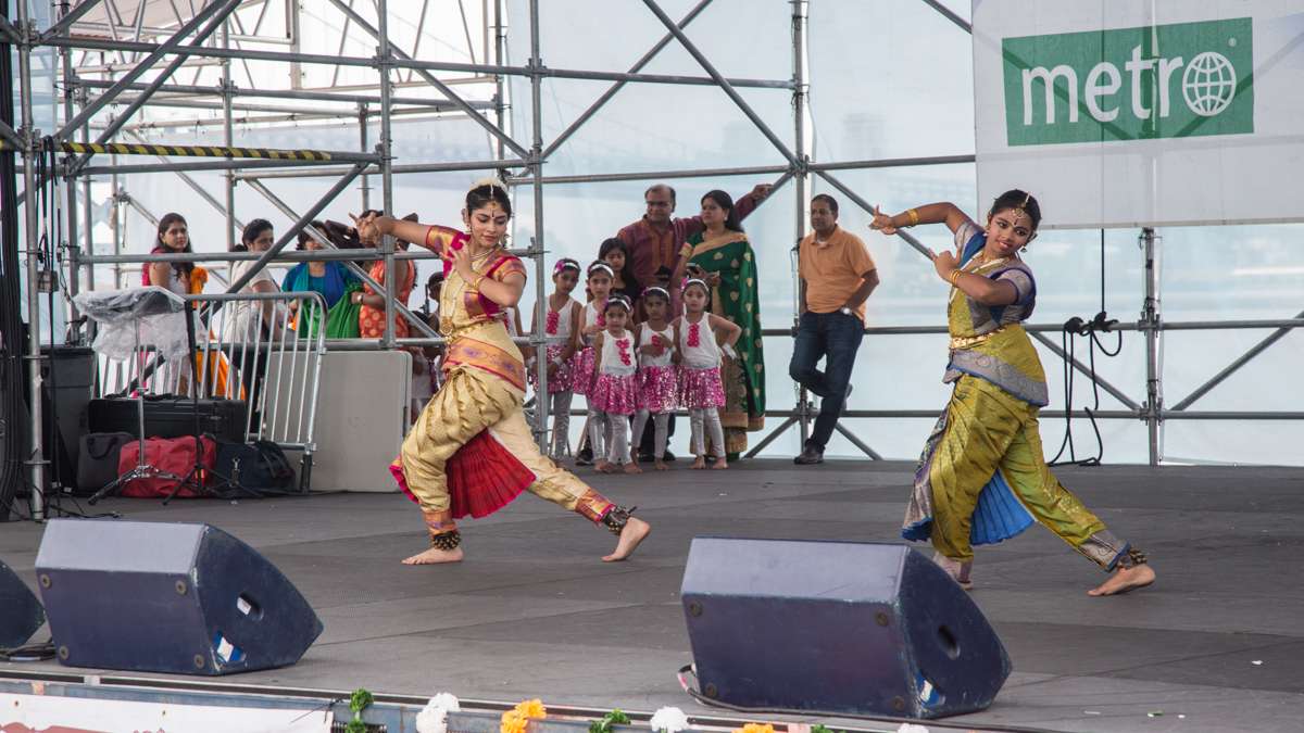 Dancers perform on stage during the Festival of India at Penn's Landing Saturday, Aug. 12, 2017. (Emily Cohen for NewsWorks)