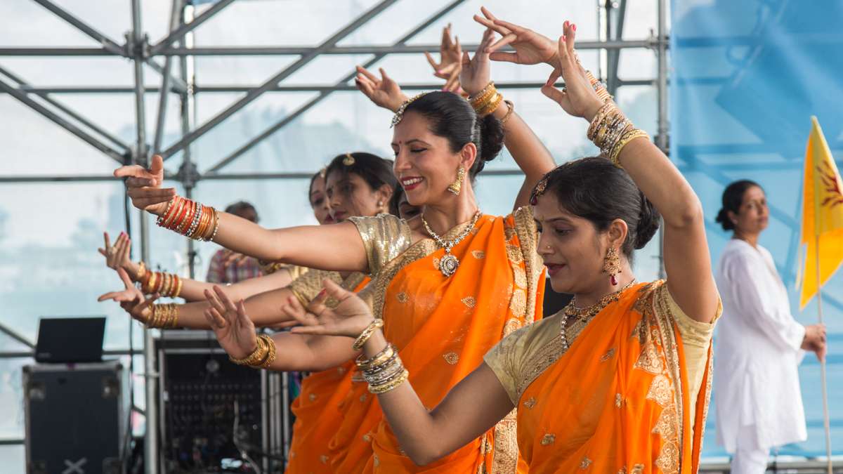Dancers perform on stage during the Festival of India at Penn's Landing Saturday, Aug. 12, 2017. (Emily Cohen for NewsWorks)