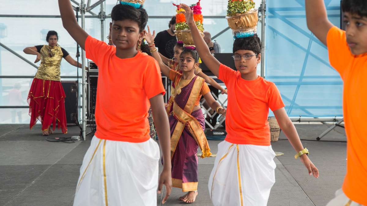 Dancers perform on stage during the Festival of India at Penn's Landing Saturday, Aug. 12, 2017. (Emily Cohen for NewsWorks)