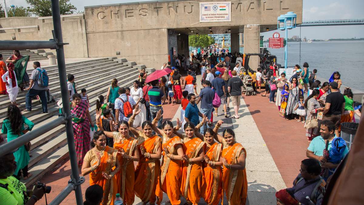 Dancers pose for photos at the Festival of India at Penn’s Landing Aug. 12, 2017. (Emily Cohen for NewsWorks)