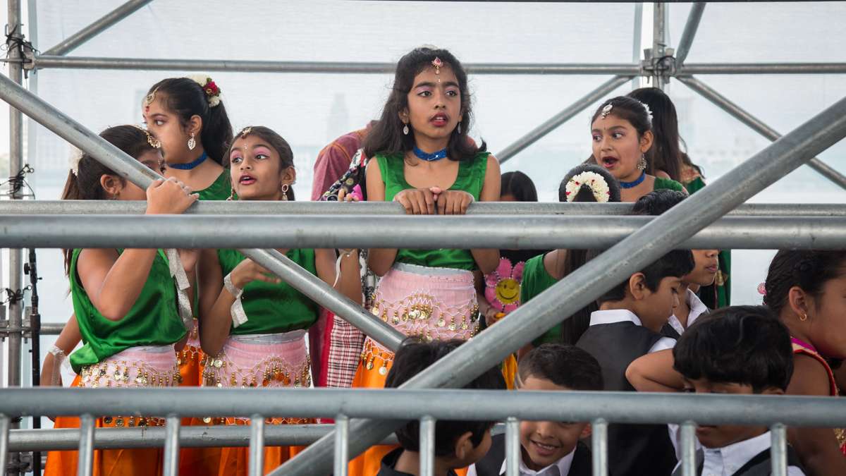 Dancers wait for their turn on stage during the Festival of India at Penn's Landing. (Emily Cohen for NewsWorks)