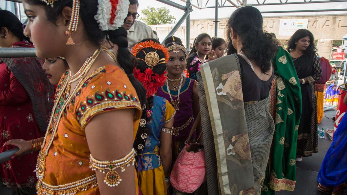 Dancers wait for their turn on stage during the Festival of India at Penn's Landing. (Emily Cohen for NewsWorks)