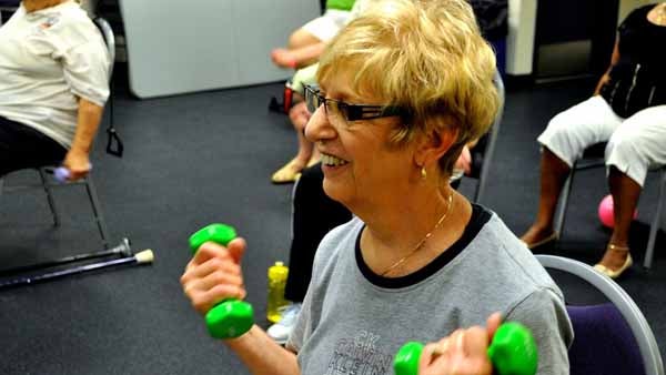  A woman participates in an exercise class at the Roxborough YMCA. (Kayla Cook and Sean Smith of Philadelphia Neighborhoods)   