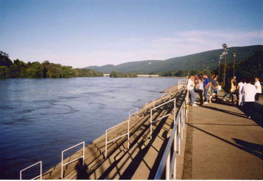 This photo from 2004 shows how high the flood waters got after Hurricane Ivan. Lock Haven sits at the lower end of the watershed, so they don't usually see the floods until a few days after the rain. Here, it's a beautiful day, except for the flooded river behind the levee. (Rich Marcinkevage, City of Lock Haven