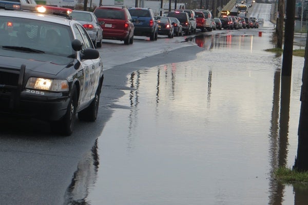 <p><p>A Wilmington Police officer monitors traffic along S. Market St. (Mark Eichmann/WHYY)</p></p>
