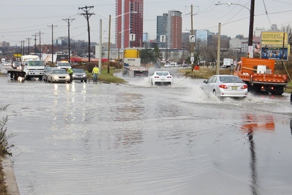 <p><p>Drivers heading into and out of Wilmington on S. Market St. found slow going due to high water. (Mark Eichmann/WHYY)</p></p>
