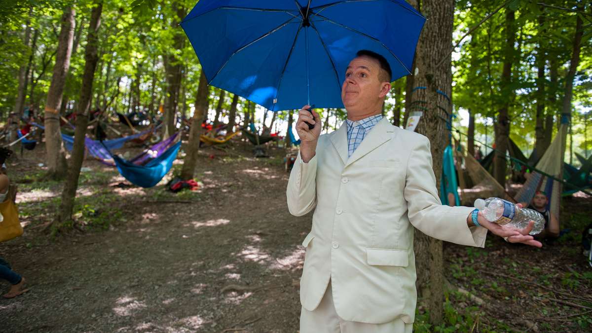 Paul Dengler, in the persona of Forrest Gump, tours the campground greeting concert goers and dispensing Gump wisdom.