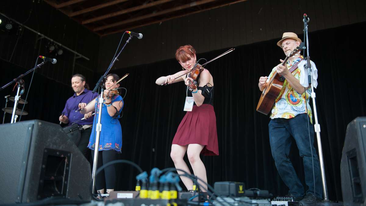 The Celtic inspired band Burning Bridget Cleary performs on the Martin Guitar Main Stage. Band members (from left) are Peter Trezzi, Amy Beshara, Rose Baldino and Lou Baldino.