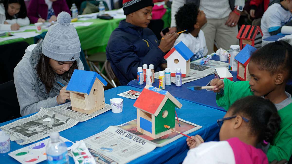 Young volunteers decorate birdhouses during the Martin Luther King Day of Service event at Girard College. (Bastiaan Slabbers/for NewsWorks)