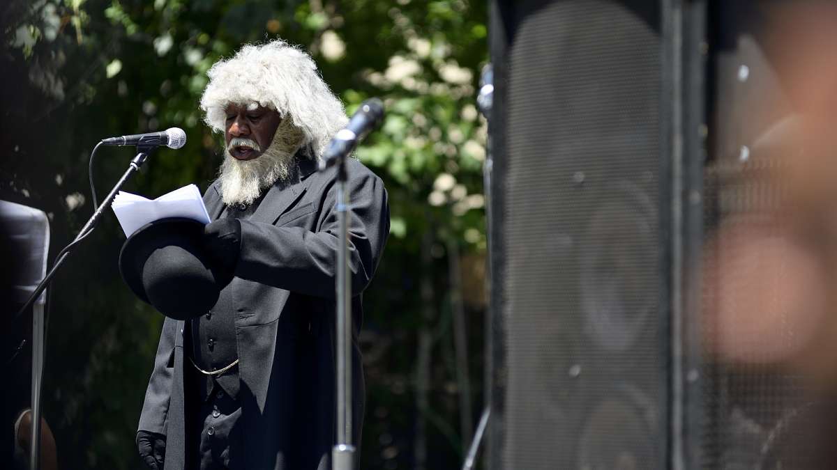 Reenactor Ron Carter, with Keepers of the Culture, reads the Emancipation Proclamation in his role as Frederick Douglass.