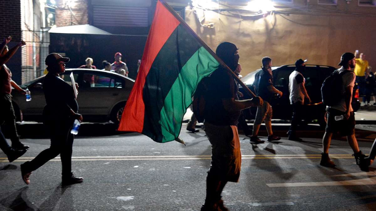 After 90 minutes outside the police station, protesters move southbound towards Allegheny Avenue.