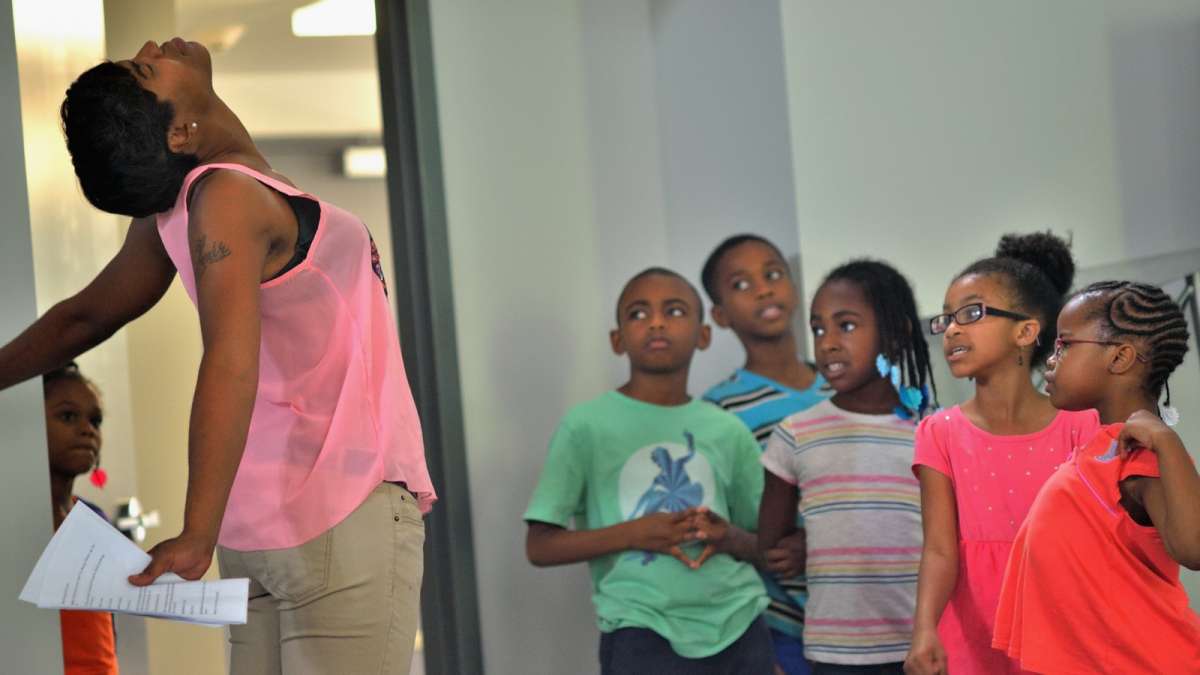 Students watch acting teacher Doree Watkins. (Bas Slabbers/for NewsWorks)
