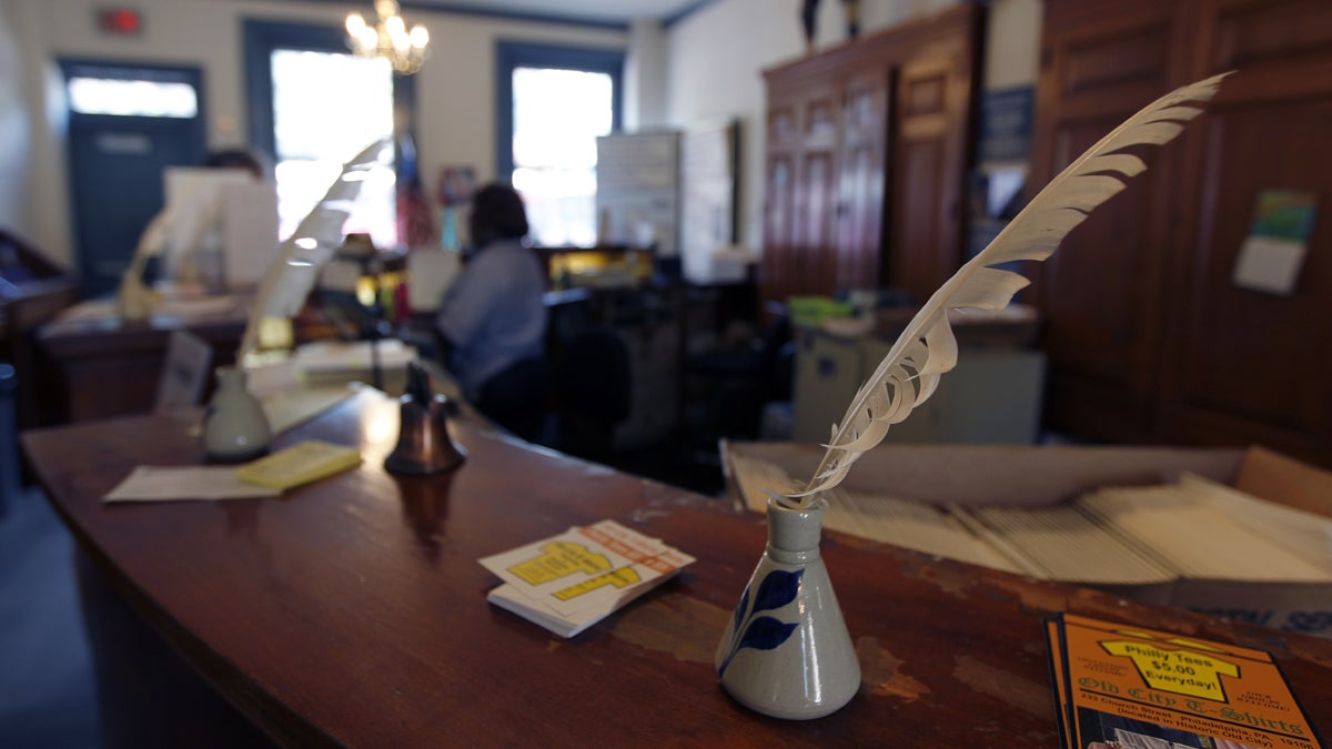  A feather quill pen is inside the United States Post Office that predates the American colonies in the Old City neighborhood of Philadelphia. (AP Photo/Alex Brandon, file) 